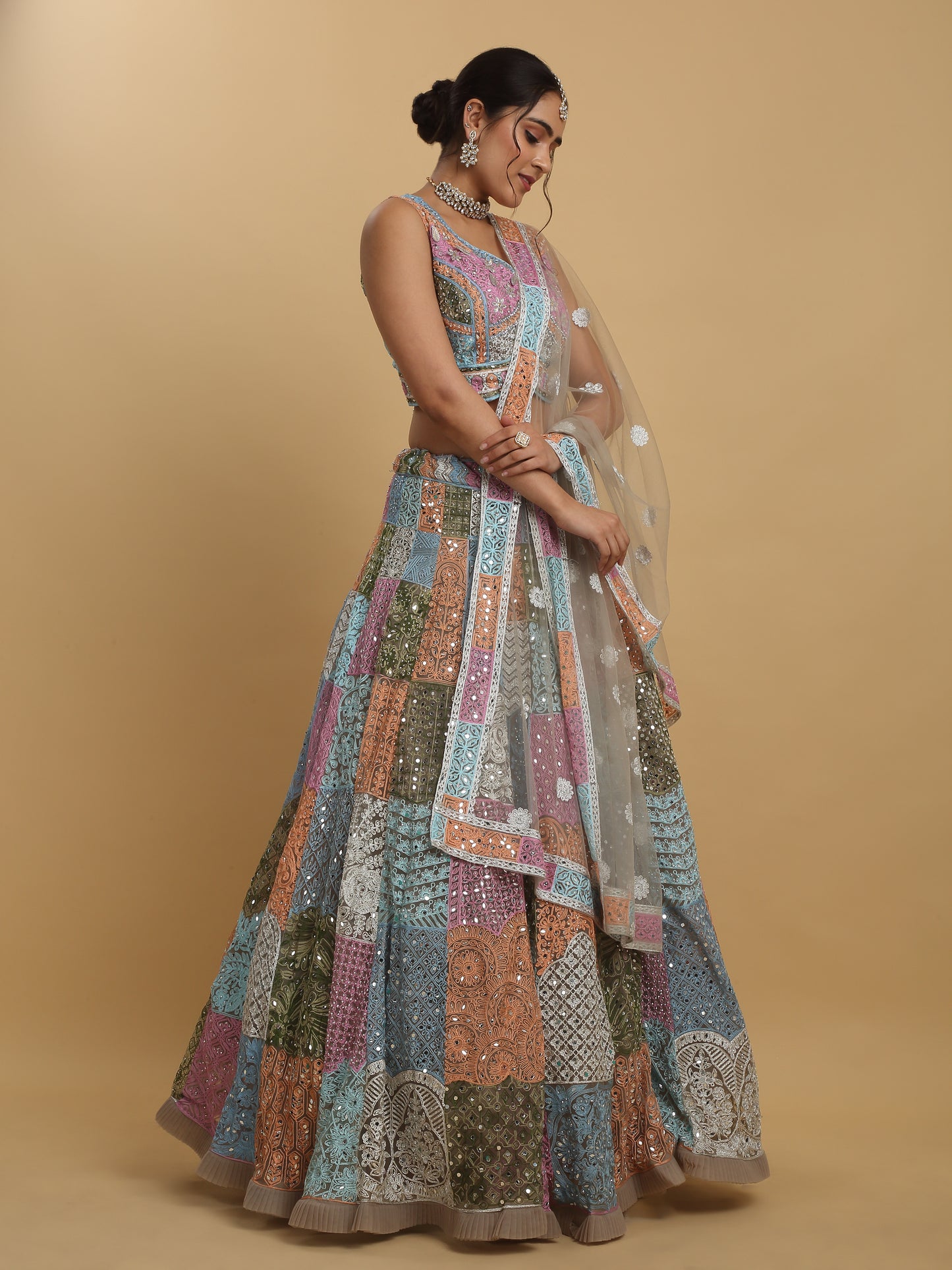 Divyam Multi Colored Thread And Mirror Embroidered Lehenga Set