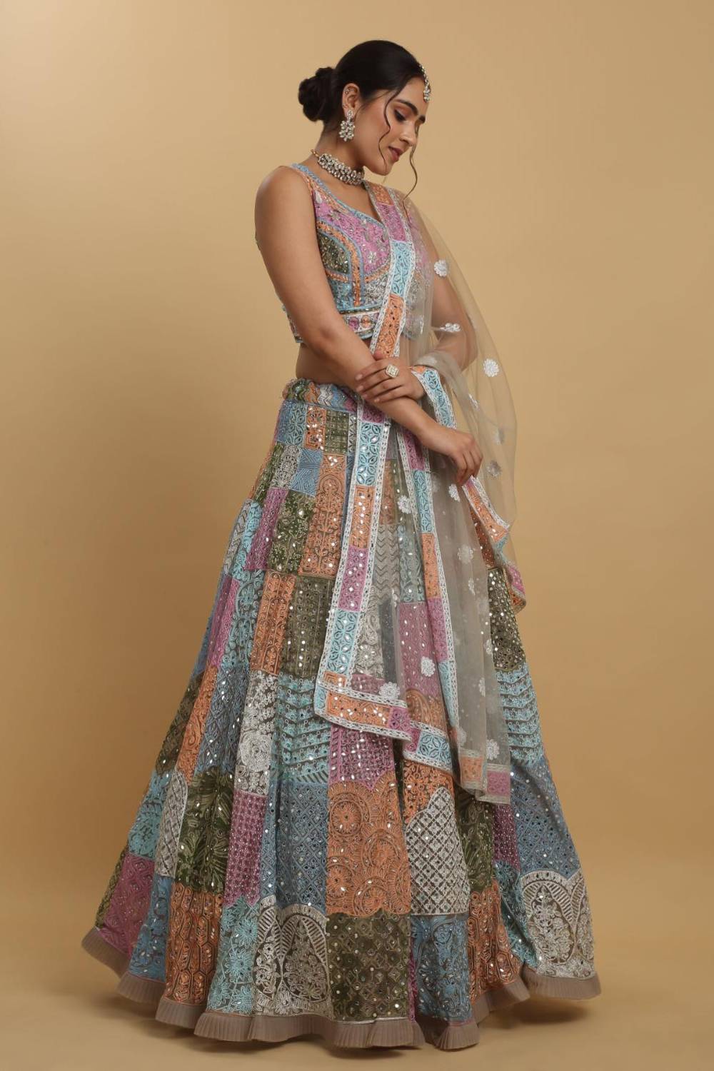 Divyam Multi Colored Thread And Mirror Embroidered Lehenga Set