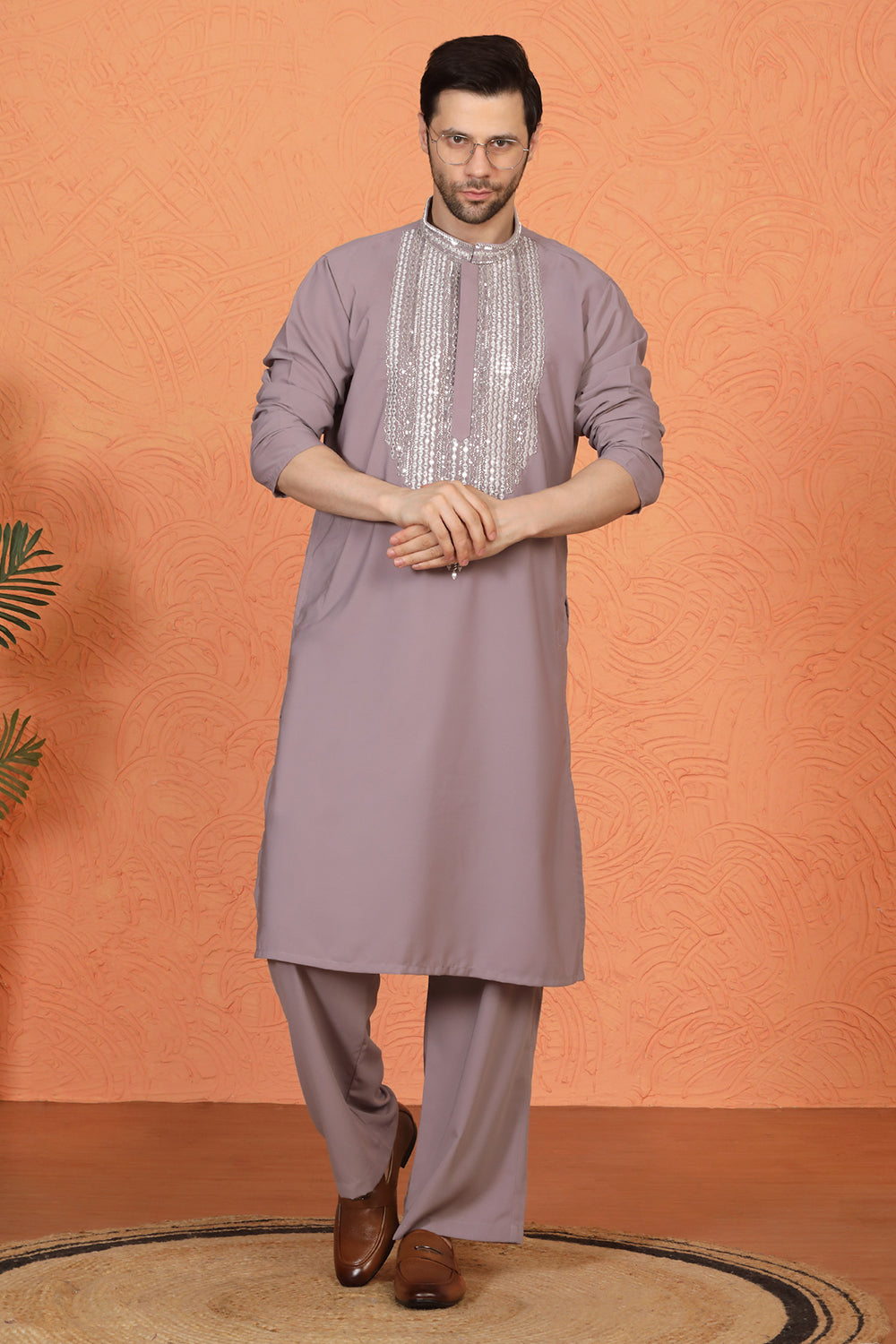 Nawaaz  Embroidered Kurta with Loose Fit Parallel Matching  Pants
