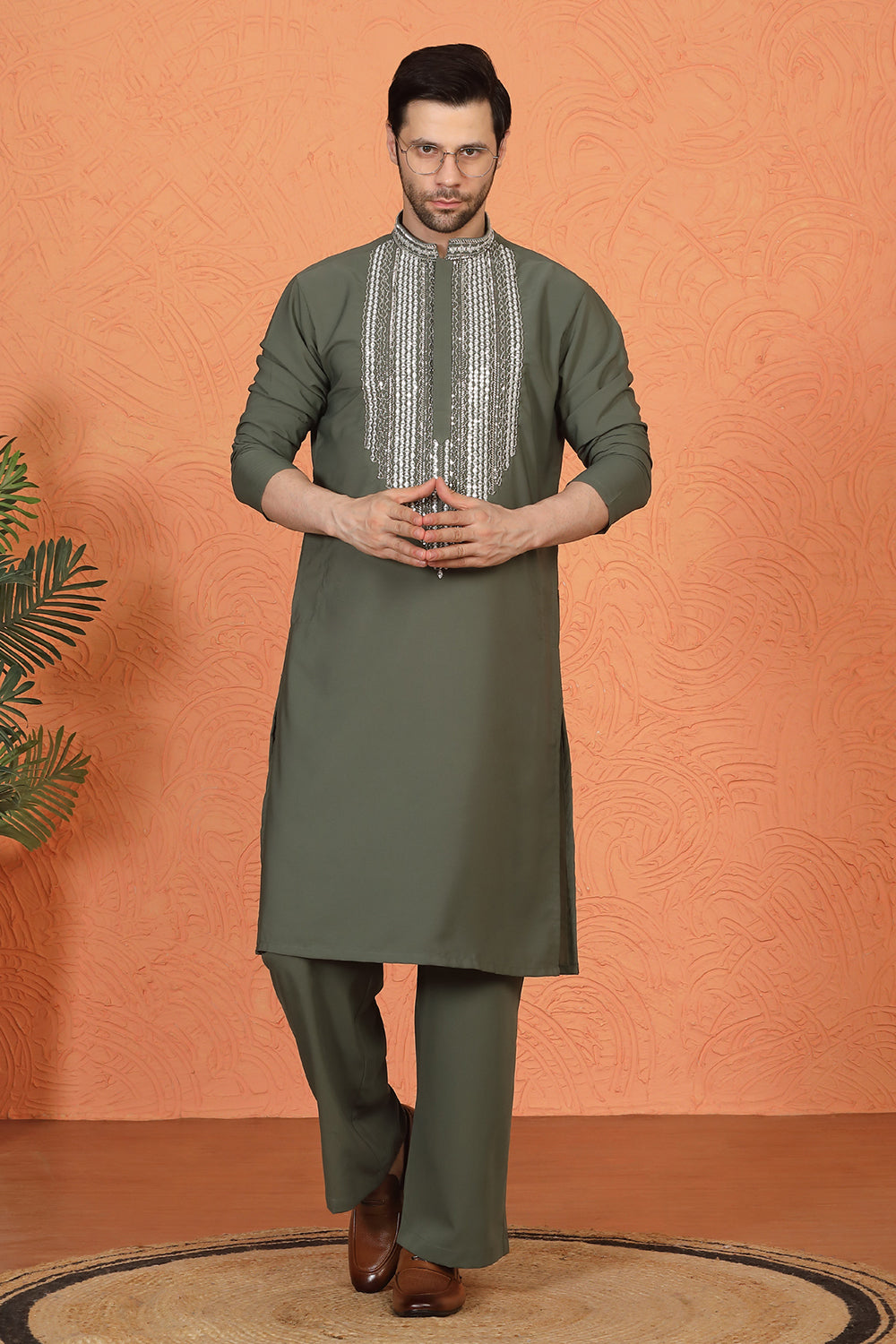 Nawaaz  Embroidered Kurta with Loose Fit Parallel Matching  Pants